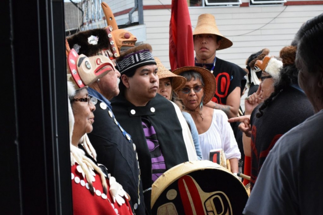 Heiltsuk welcome Haida to enter the potlatching hall at Waglisla (Bella Bella) in July.